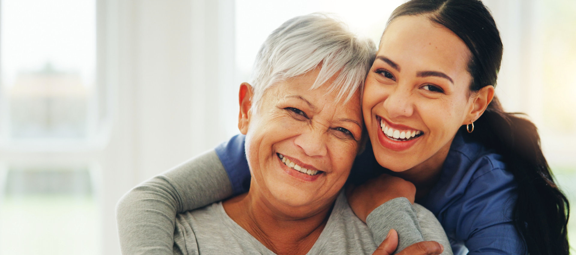 nurse and elderly smiling