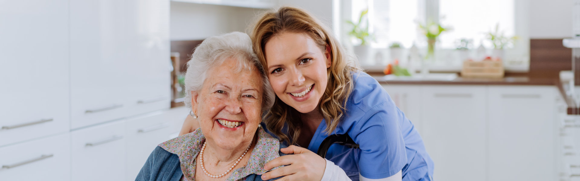 nurse and elderly smiling