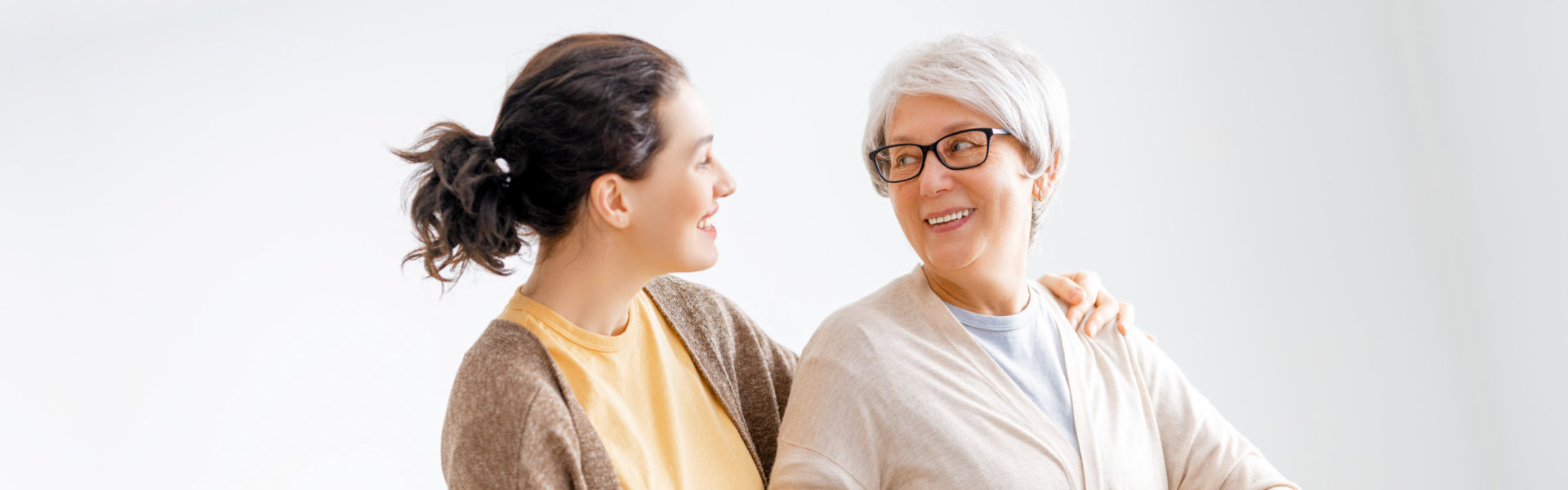 woman and elderly woman talking